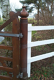 Photograph of a turned column gate post